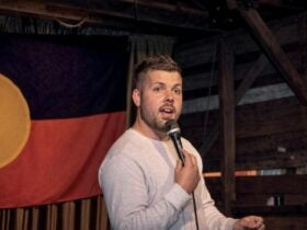 Aden Hitchens Comedian on stage