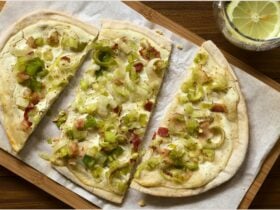 A leek and bacon flammekueche with a glass of limocello spritz