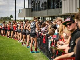 Essendon Players signing fans autographs