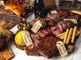 A selection of traditionally made salumi with a bottle of Kay Brothers grenache