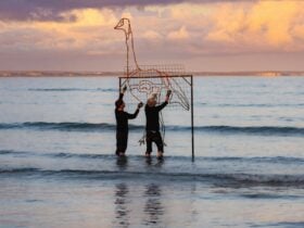 Mark and Will put the final touches on Garrdi fire sculpture