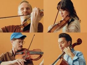 The four members of the Australian String Quartet with their Guadagnini instruments.