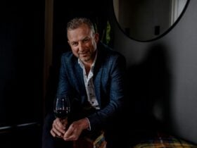 Winemaker Shawn Kalleske holding wine glass