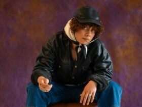 Artist MÄ sitting looking at camera