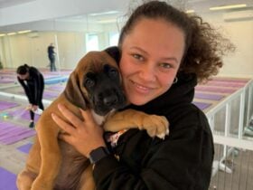 Co-Founder, Tea-Maria, with a Boxer x Great Dane puppy!