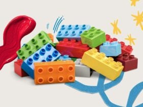 Pile of colourful Lego bricks and splashes of paint