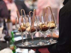 Wine glasses on a tray with chocolate inside
