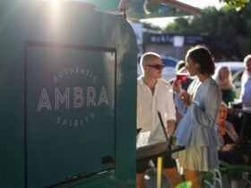 Ambra Spirits Spritz Van with guests in sunset