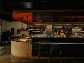 Chefs working in an open kitchen