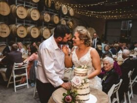 Winery wedding at Cape Jaffa Wines Cellar Door, featuring a barrel room reception with fairy lights