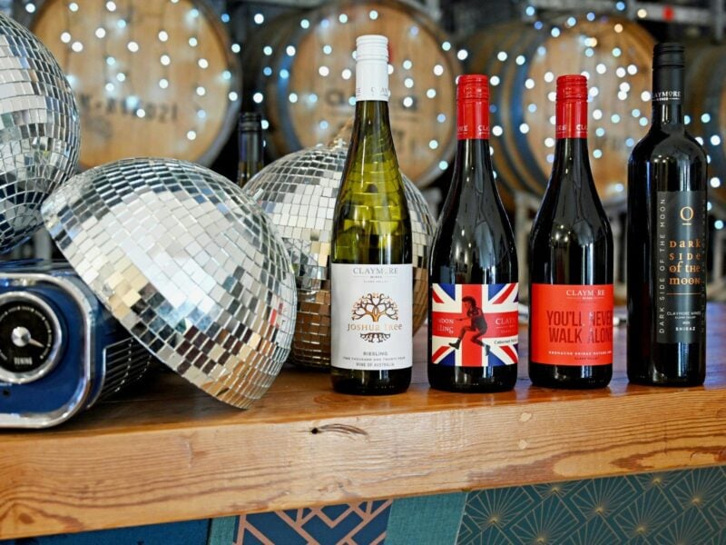 four claymore wines near disco balls on the cellar door counter