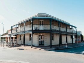 Exterior of the Criterion Tavern featuring a two-story heritage building with a wraparound balcony.