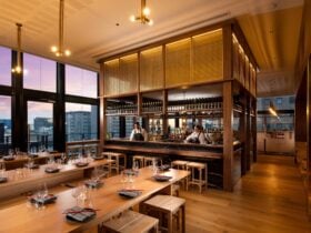Group dining and grand island bar at Koomo