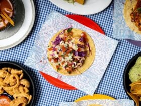 table scape of La Popular Tacqueria's menu including baja-style fish taco