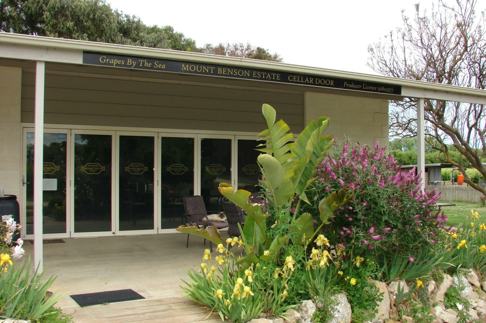 Footbridge entry and gardens of the Mount Benson Estate Cellar Door