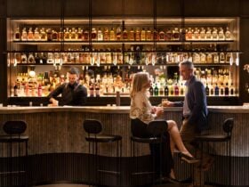 A couple sitting at the Lodge Bar in Restaurant
