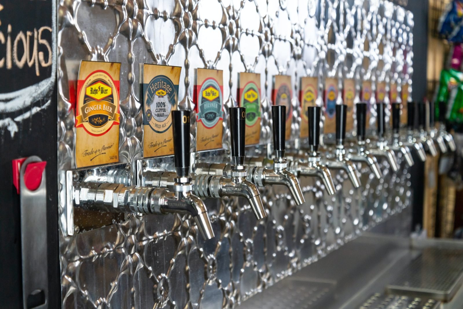 Beer taps with pressed metal background