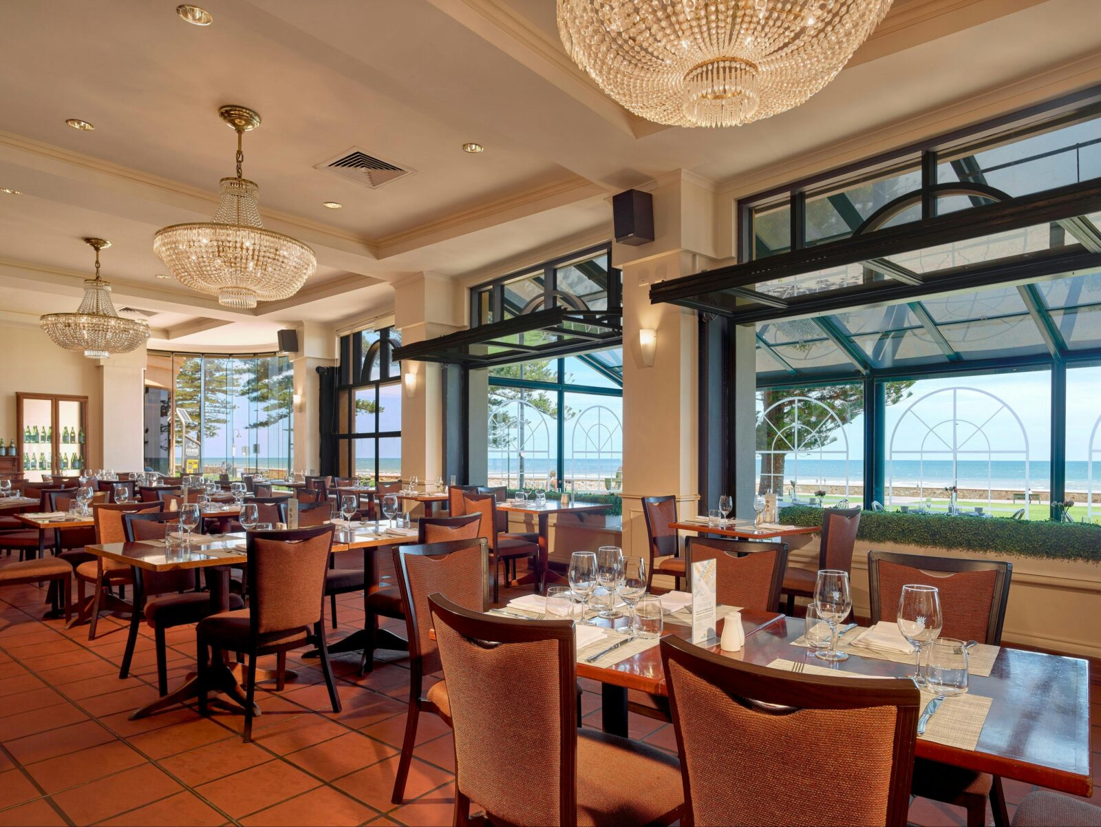 tables, chairs, windows, beach side, beach, views, chandeliers