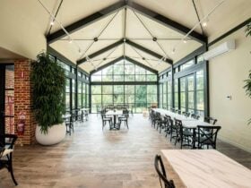 glass conservatory area with seating