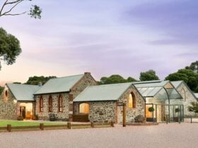 The stone cellar door of Chapel Hill wines, the original chapel visible as the central peak