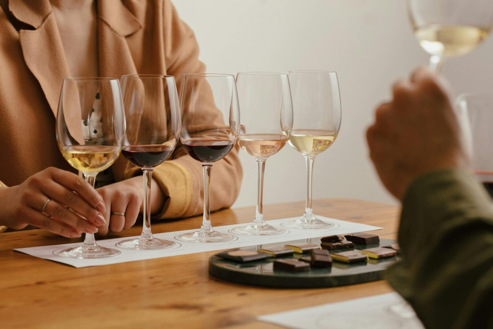 Wine flight on table with chocolate pairing