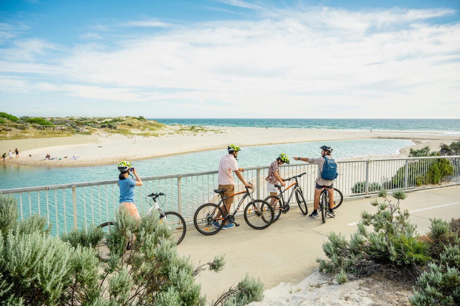 Riders stop and take a moment to take in the view of the beach