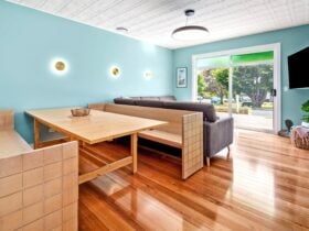 Main dining and lounge area with access to deck.