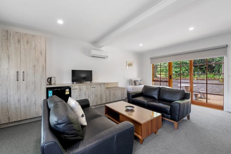 Deluxe Suite lounge area and patio