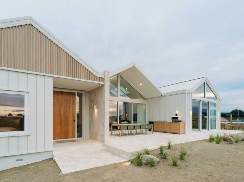 Front of house with alfresco area showing pizza oven, barbecue and seating for 10 people