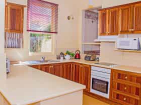 Fully equipped kitchen in each cottage