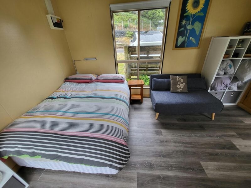 Double bed and small sofa which can fold down for additional single bed.