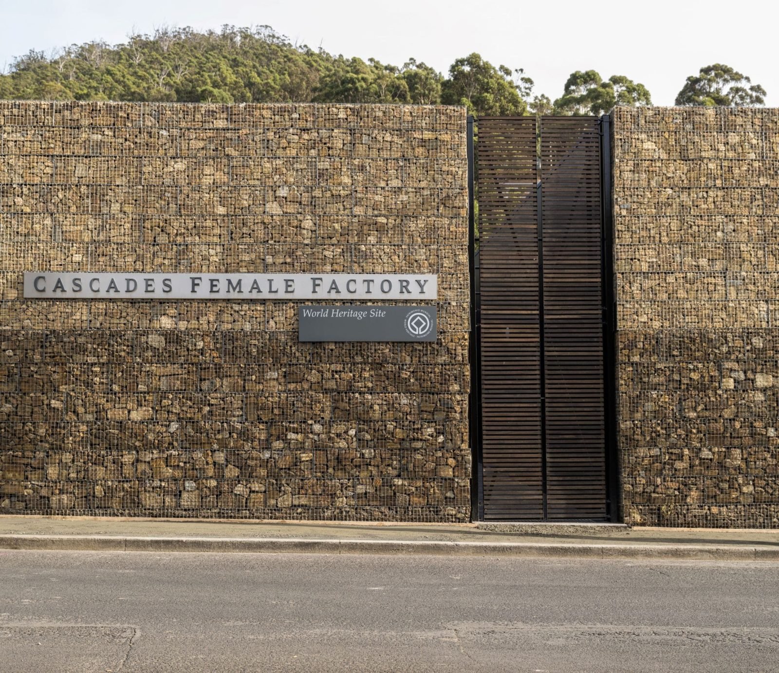 Cascades Female Factory Entrance. High sandstone walls at each side of the gate.