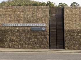 Cascades Female Factory Entrance. High sandstone walls at each side of the gate.