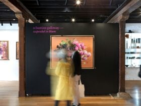 Inside Handmark showing exhibition art, and displays holding sculpture, ceramics and jewellery.