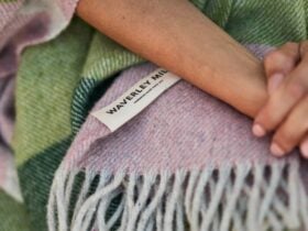 Hands crossed over Breezy Throw in Bloom
