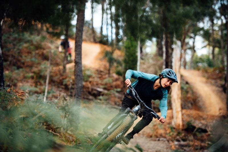 Female rider flows on trails