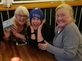 Trivia Team excited to win a prize