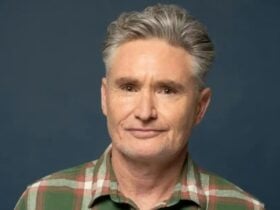 a portrait of Dave Hughes on a dark blue background