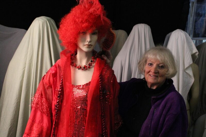 Dressed mannequin and artist/maker at Museum of Wearable Art