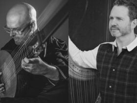 two men playing instruments