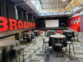 A photo of seats and tables in the room at the School of Arts for the Tamar Valley Film Festival.