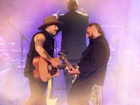 the wolfe brothers in front of the conductor