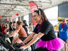 Sally in a tutu spinning to raise funds for Tassie Kids
