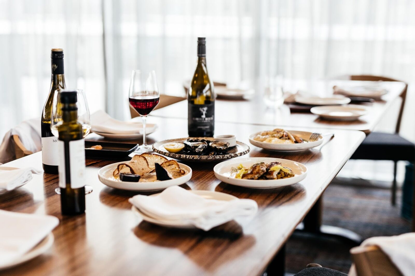Food & wine displayed on dining table