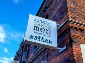 Street signage over the front door of the establishment