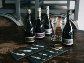 Pirie wine bottles with glasses and caviar spoons