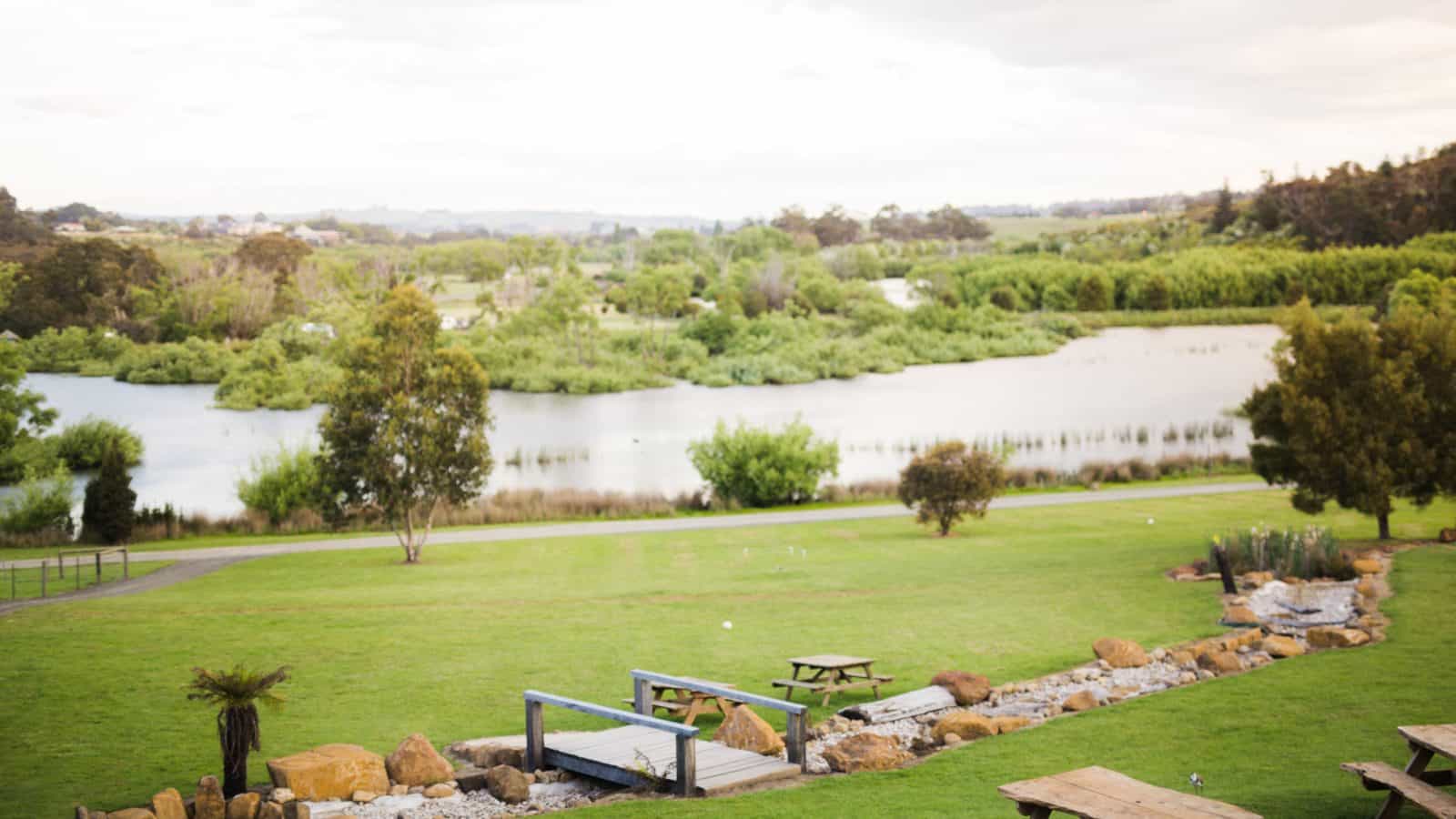 View from restaurant of lawns, creek and lake.