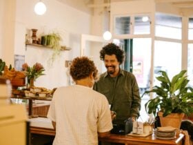 A happy customer being served at Sunbear cafe