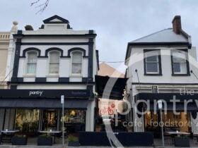 A historic building in housing a cafe in heritage colours
