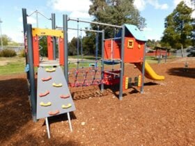 Park with colourful childrens play equipment